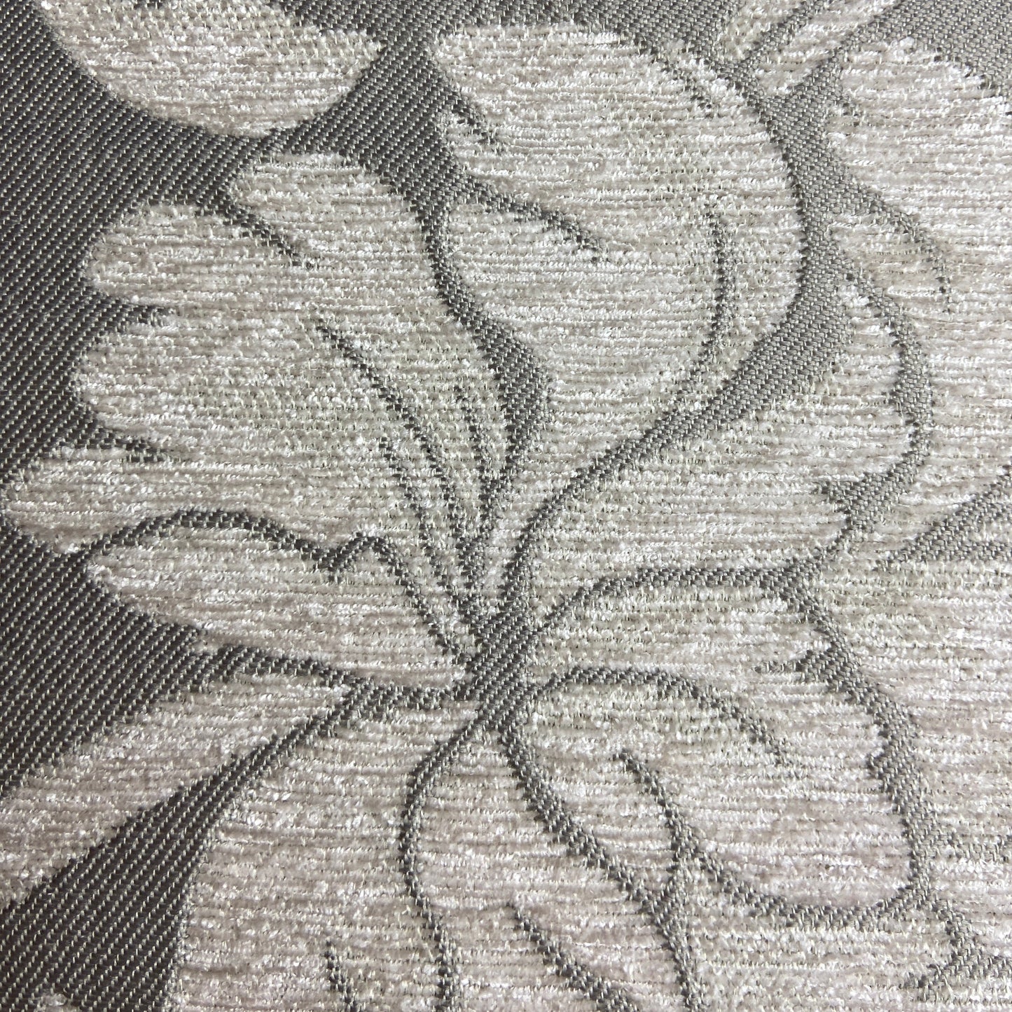 Close-up of a textured fabric with floral pattern