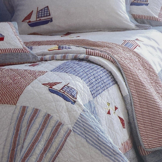 Packaged bedding set with patterned design on a white background