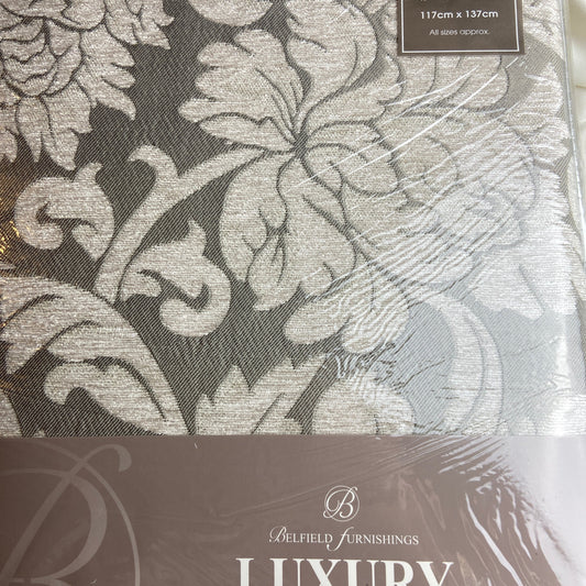Curtain fabric with floral pattern and brand label on packaging