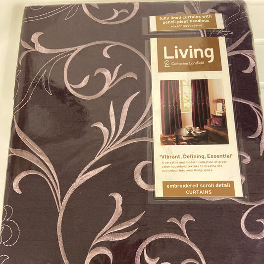Baroque Aubergine Pencil Pleat Curtains by Catherine Lansfield. The faux silk sheen fabric in aubergine with a lilac embroidered scrolling design across the middle. Fully lined. Face 100% polyester slub silk excluding trims. Lining 100% polyester.
