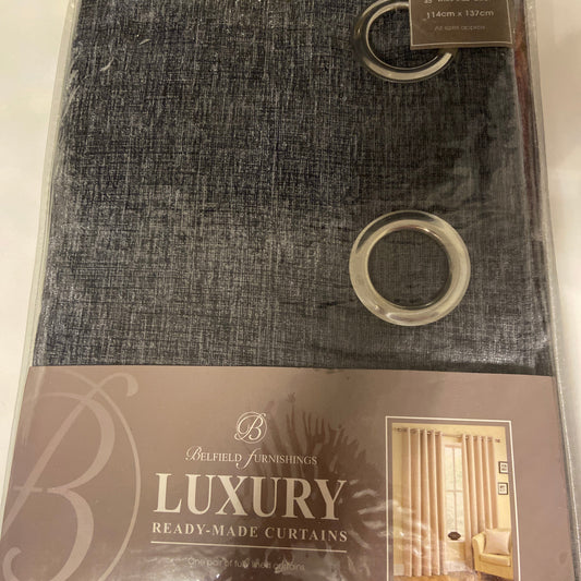 Rico Eyelet Curtains by Belfield Furnishings. One pair of fully lined chenille curtains in Pewter. Face and lining 100% polyester.
