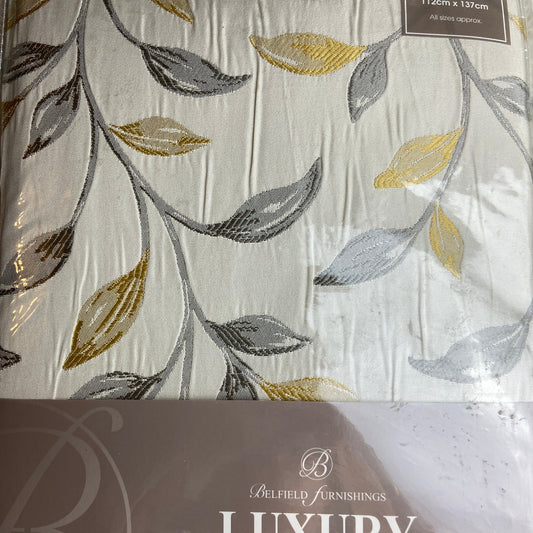 Packaged curtain with leaf pattern and brand name on packaging
