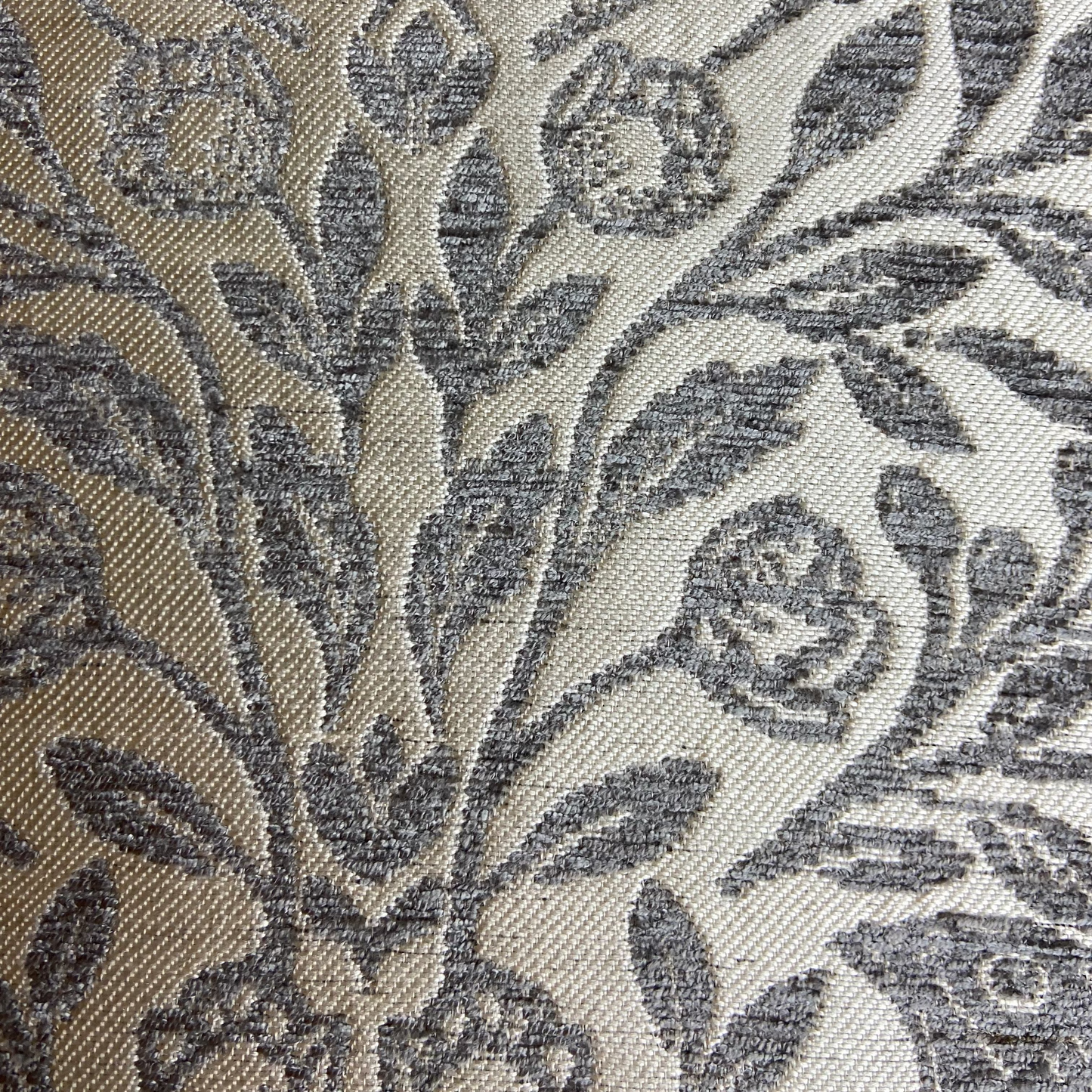 Close-up of a floral patterned fabric with intricate design.