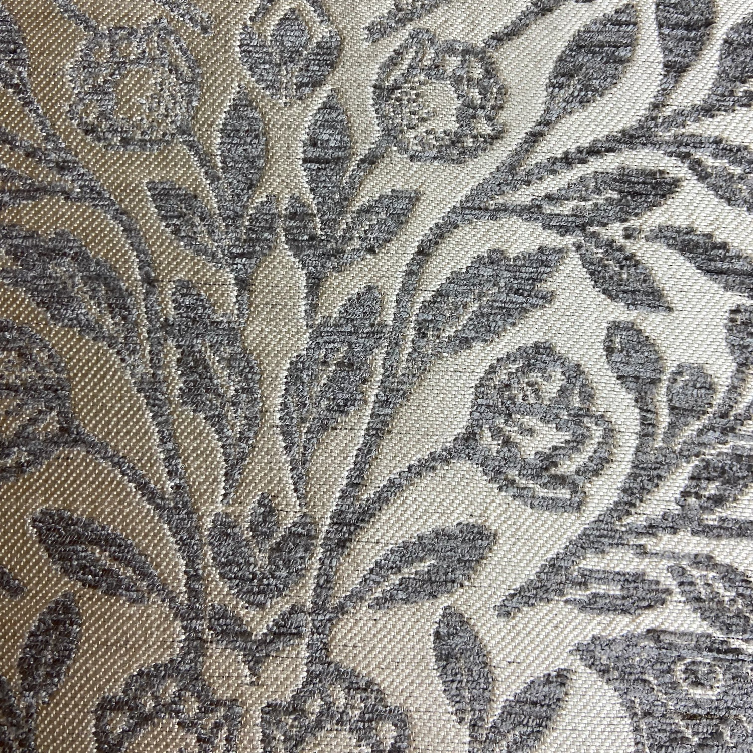 Close-up of a floral patterned fabric with intricate design.